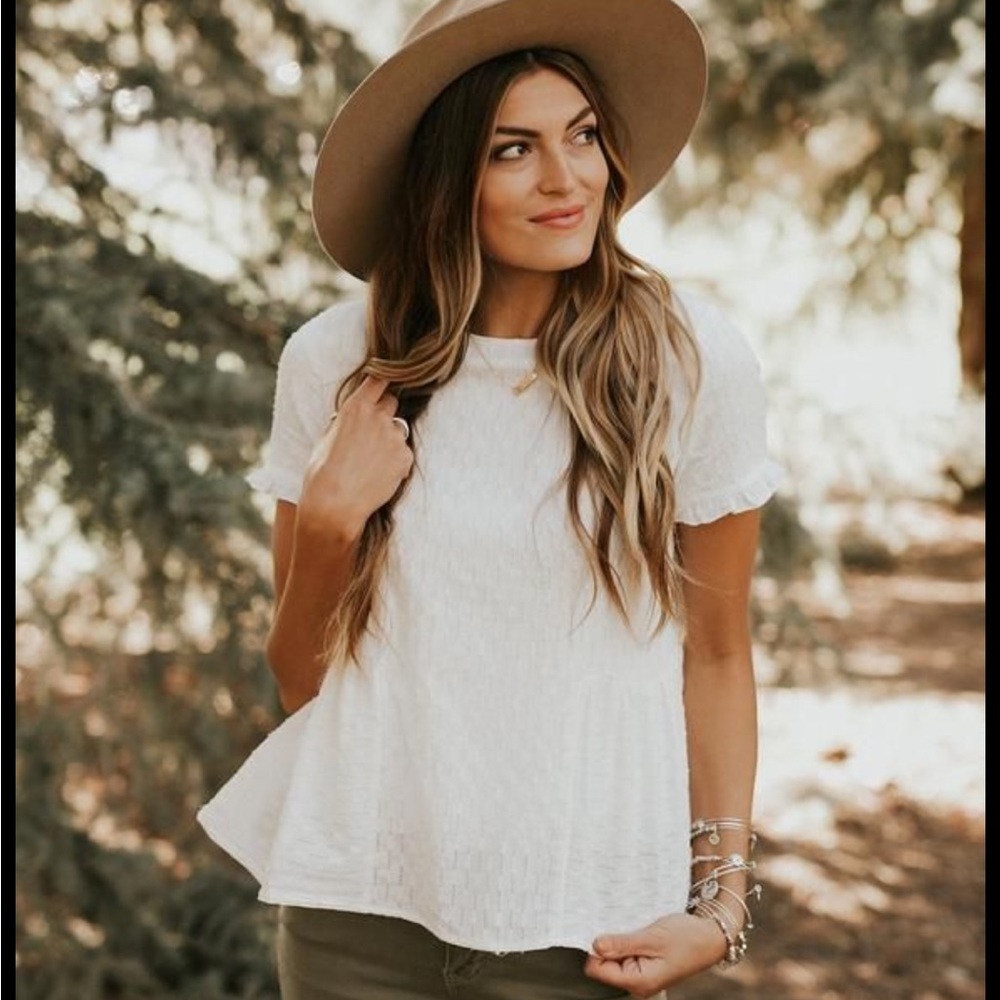White polka dot peplum top